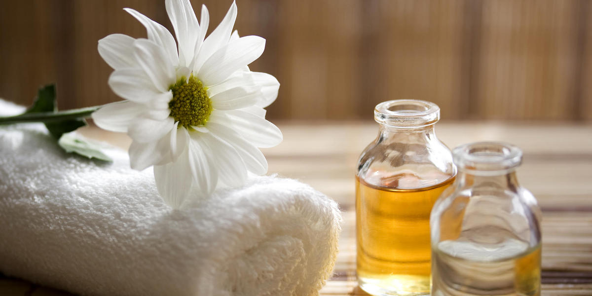 Flower, towel, and spa oils